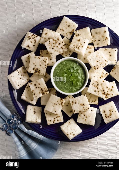 Indian snack white dhokla with green chutney, India, Asia Stock Photo ...