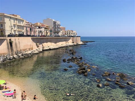 Small beach in Ortigia in Siracusa, Italy : r/travel