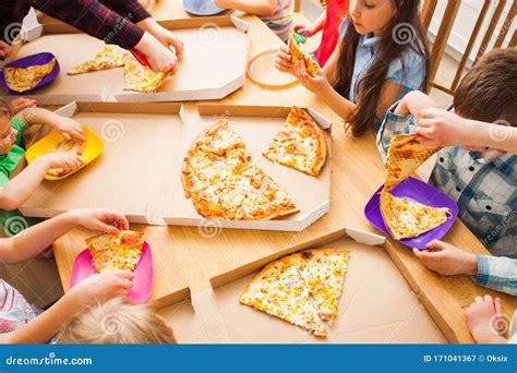 Happy Children Eating Pizza Enjoying Birthday Party in Cafe Stock Image - Image of emotion ...