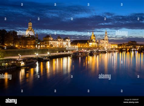 Cityscape at night with Frauenkirche church, Dresden Cathedral and Dresden Castle, Elbe river ...