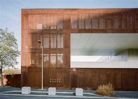 Minimum security prison made of steel has pastel-coloured sports court | Architecture, Metal ...