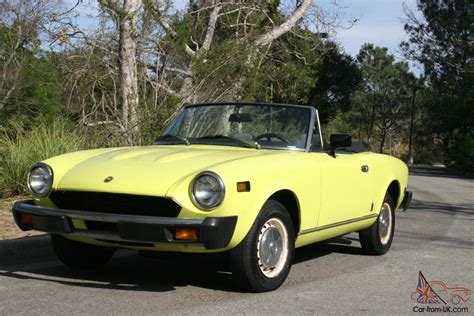 PRISTINE VINTAGE YELLOW CONVERTIBLE FIAT124 SPIDER 1975 - A COLLECTOR'S ITEM!!