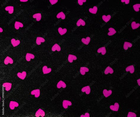 Black background with pink hearts Stock Photo | Adobe Stock