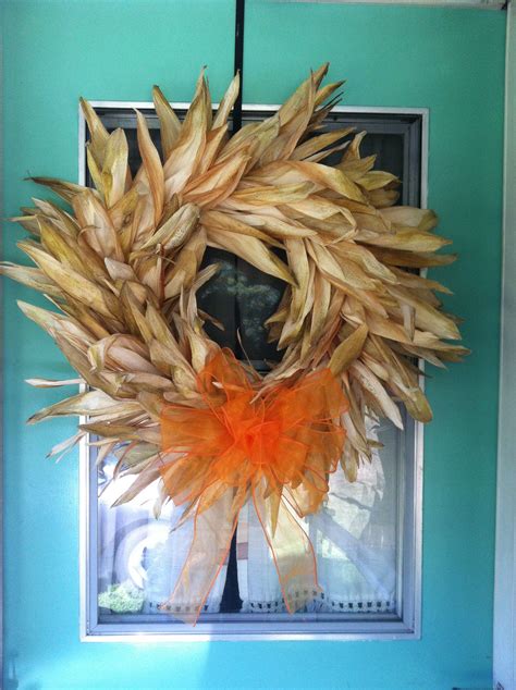Very easy corn husk wreath I made. Bought a foam frame and wire and wrapped corn husks. Super ...