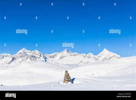 Panorama view of the Pennine Alps on the Italian-Swiss border near Zermatt, Switzerland. A ...