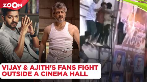 Thalapathy Vijay and Ajith Kumar's fans FIGHT & tear posters outside a cinema hall in Chennai ...