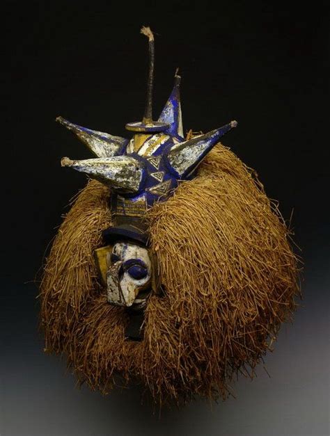 Yaka mask, Democratic Republic of Congo. Painted wood and raffia ...