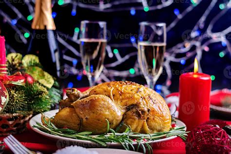 Baked turkey. Christmas dinner. The Christmas table is served with a turkey, decorated with ...