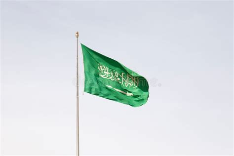 Saudi Arabian Flag Waving Against Clear Blue Sky Stock Photo - Image of ...