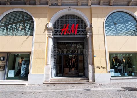 ATHENS-AUGUST 22: H&M Store Showcase on Emrou Street on August 22,2014 Athens, Greece. Editorial ...