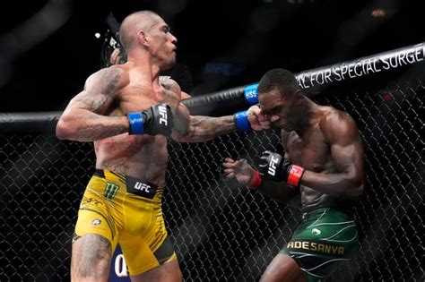 Israel Adesanya told he may have to use poison to finally beat "boogeyman" rival - Mirror Online