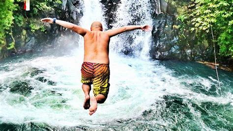 Jumping Sliding Aling-aling Waterfall - Upadani Bali Tour