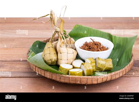 Ketupat, lemang, served with serunding, popular Malay delicacies during ...