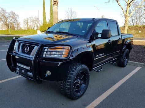 custom wheels 2014 Nissan Titan PRO 4X Crew Cab for sale