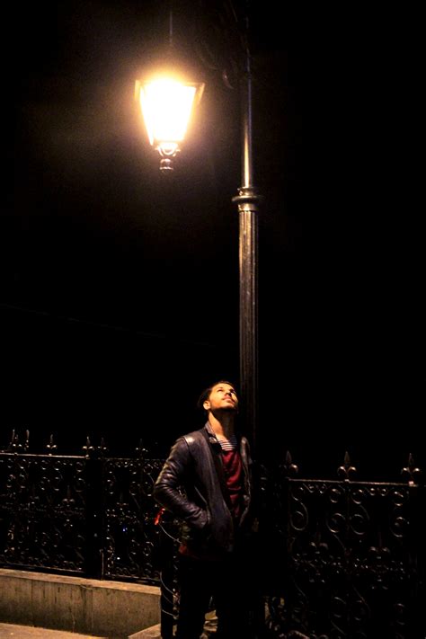 man standing on street light photo – Free Human Image on Unsplash in 2024 | Night photography ...