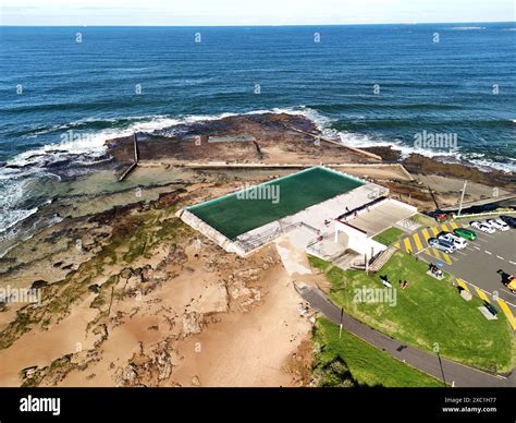 An aerial view of a coastal rock pool and beach in Austinmer, New South Wales, Australia Stock ...