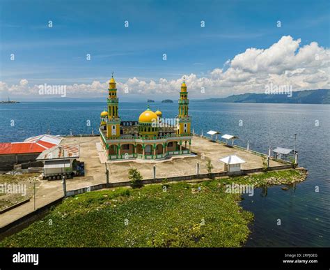 Linuk Masjid a mosque beside the Lake Lanao in Lanao del Sur. Blue sky ...