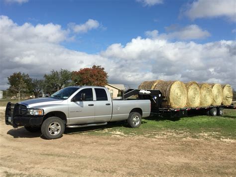 Dodge hauling hay | Dodge trucks, Chevy trucks, Work truck