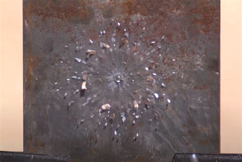 High-Speed Camera Shows What Happens to a Bullet When it Hits Steel in ...