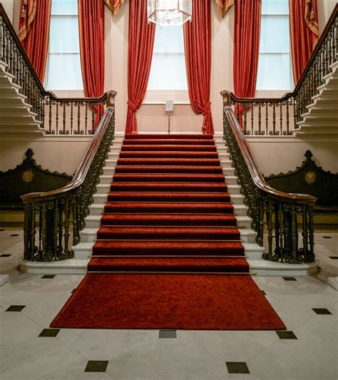 inside building with red carpet on stairs photo – Free Dublin castle ...