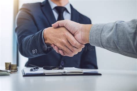 Handshake of Cooperation Customer and Salesman after Agreement, Stock ...