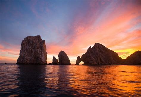 Cabo awakens to a beautiful sunrise over Lands End www.conniemex.com | Cabo san lucas, Cabo san ...