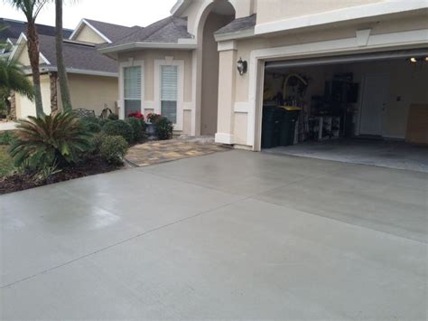 Stunning remodeled concrete driveway! | Painted concrete floors, Driveway paint, Patio