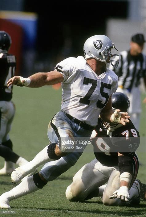 Defensive Tackle Howie Long of the Los Angeles Raiders plays against ...