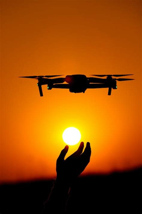 Silhouette of Drone at Golden Sunset · Free Stock Photo