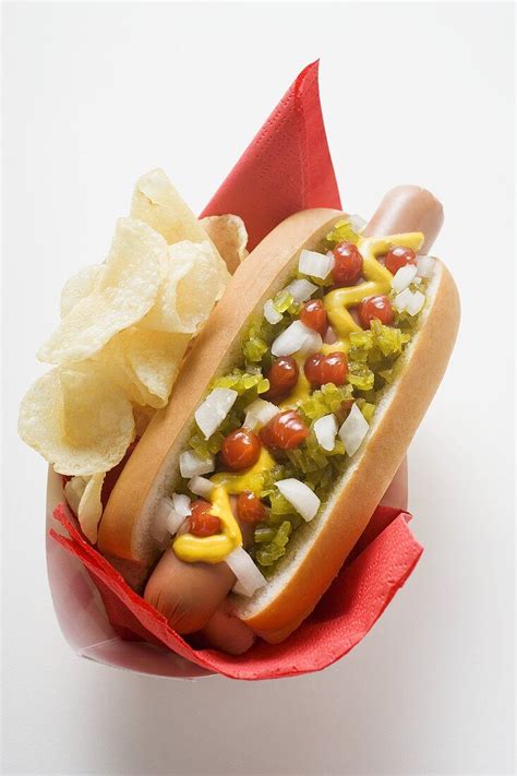 Hot dog with relish, mustard, ketchup, … – License image – 928982 Image Professionals