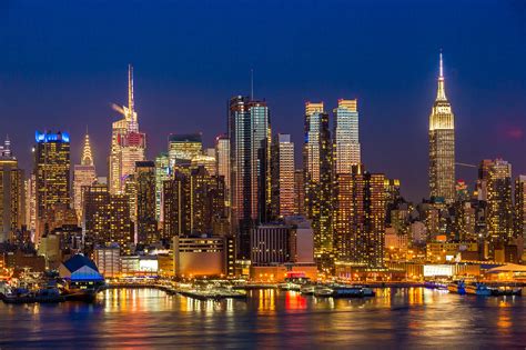 New York City Manhattan midtown buildings skyline night - Et Al Management
