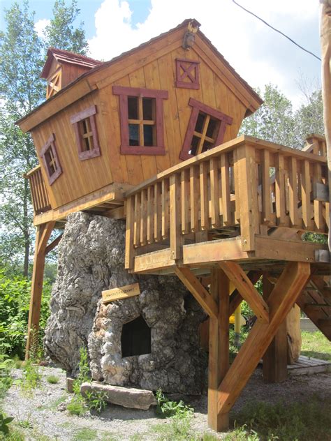 awesome tree fort, and adult friendly, bottom is a huge tree stump that ...