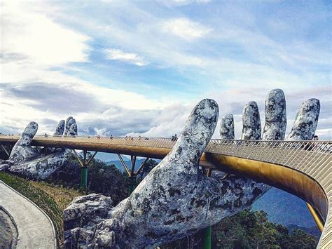 Vietnam's Newly Opened Pedestrian Bridge Lifts Visitors with a Pair of ...