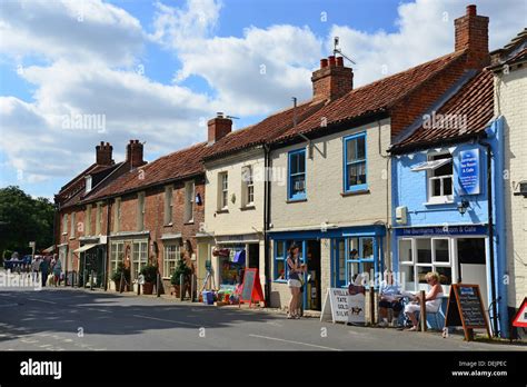 Shops and restaurants on Market Place, Burnham Market, Norfolk, England, United Kingdom Stock ...