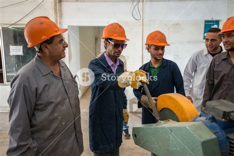 Workers in industrial factory Royalty-Free Stock Image - Storyblocks