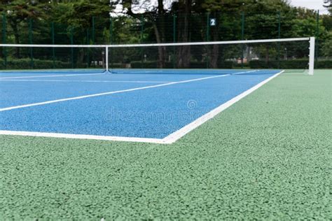 Detail of a Blue Tennis Court with Black Net on Outdoor Stock Image ...