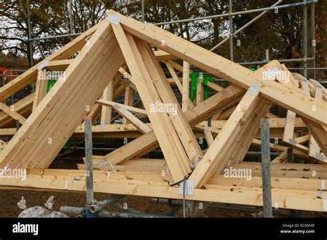 Wooden roof trusses on a UK construction site Stock Photo, Royalty Free Image: 76234419 - Alamy