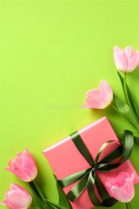 Tulip Flowers and Gift Box on Vertical Green Background. Happy Mothers ...