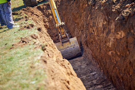 Excavator Digging Trench