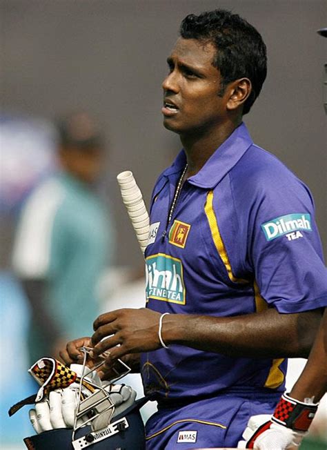 Angelo Mathews walks back after scoring an unbeaten 52 | ESPNcricinfo.com