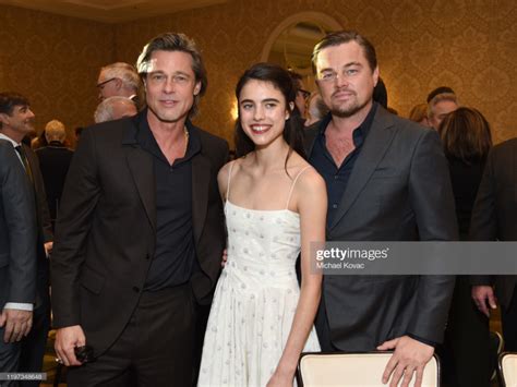 Brad Pitt, Margaret Qualley, and Leonardo DiCaprio attend the 20th ...