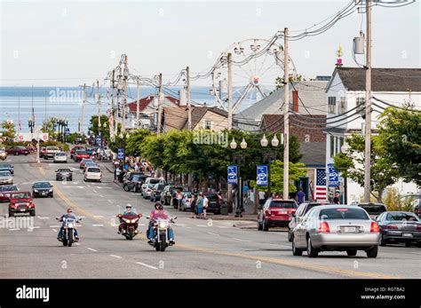 OLD ORCHARD BEACH, MAINE - JULY 25: People enjoy the main street in the Historic Old Orchard ...