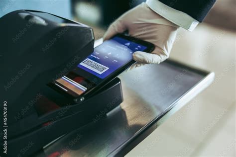 Scanning of boarding pass by airport staff Stock Photo | Adobe Stock