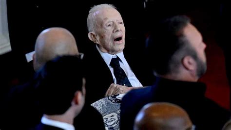 Jimmy Carter makes rare public appearance to attend wife's memorial service