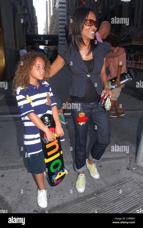 Robin Givens out and about with her family including sons Michael and ...