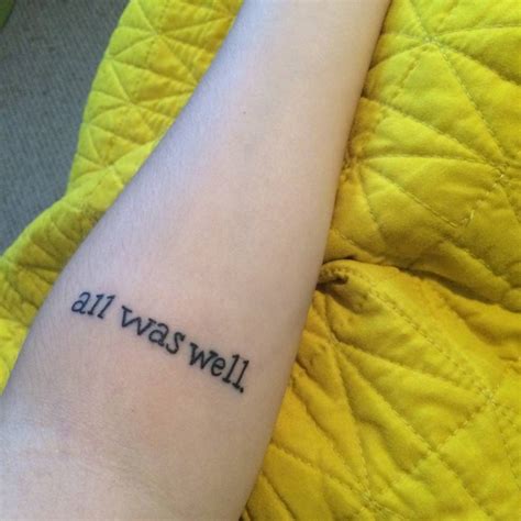 Forearm tattoo saying "All was well".