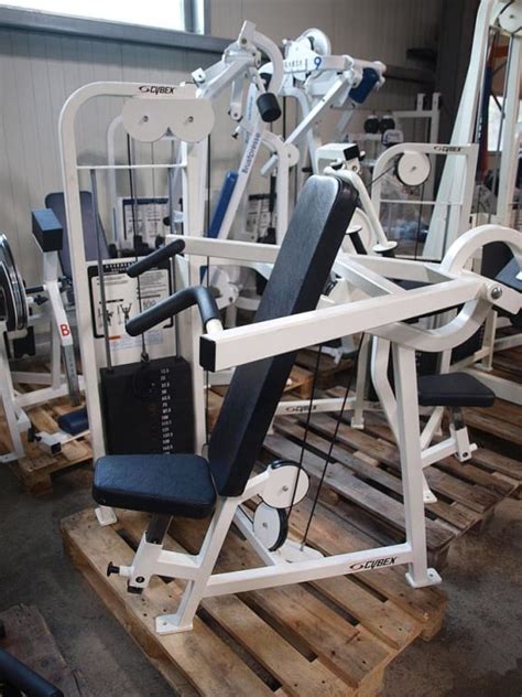 Ad - Cybex Strength Training Equipment, 12 machines, white and black, used