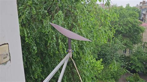 Starlink satellite dish, an internet constellation operated by SpaceX, is installed on the wall ...