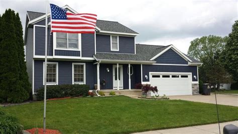 Premier Roofing & Exteriors installed siding. The siding installed is Royal, color, Marine Blue ...