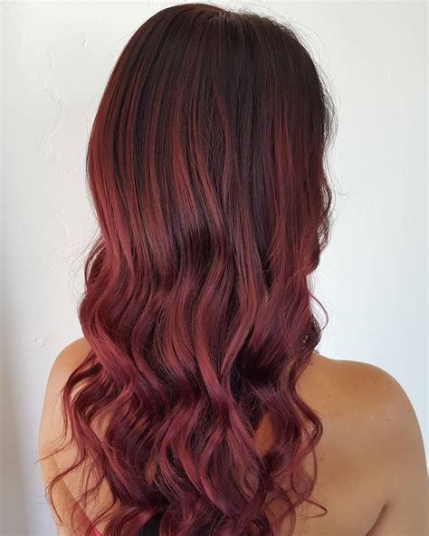 Cranberry Red Is the Sauciest Hair-Color Trend of the Holiday Season | Hair color, Winter ...